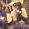 Matt Deighton and harmonica player